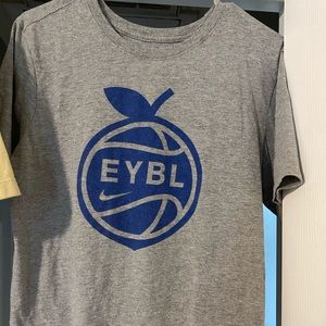 Used Nike EYBL T-shirt! Adult Medium but fits more like an Adult Small.